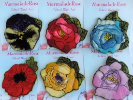 Felted flower brooches